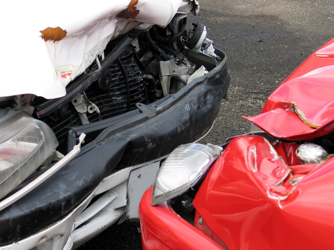 Woman dies in head on collision